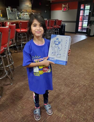 kid holding toy box