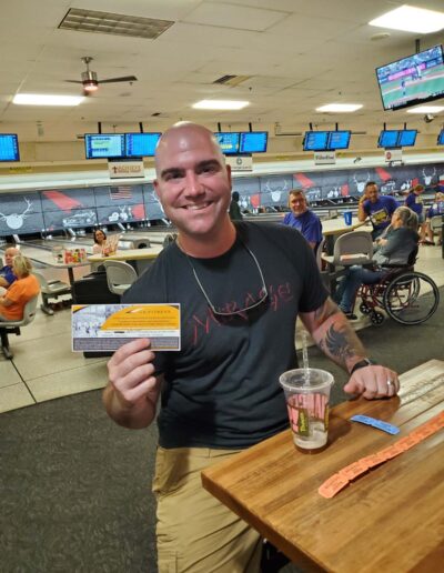 man at bowling alley