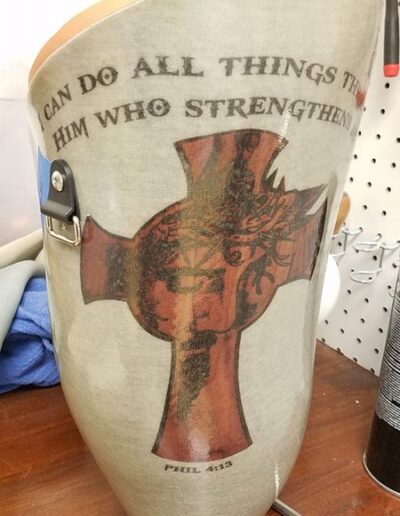 Christian strength design on prosthetic