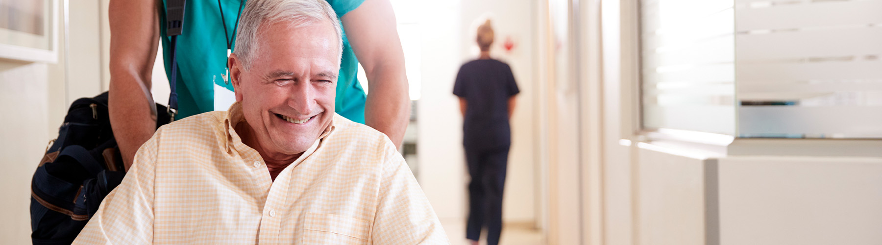 Man in a wheelchair smiling